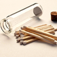 FREE - 1 Corked glass vial .8 W x 2.55 H with 20 matches and adhesive phosphorous match striker on bottom of glass. 2 inch wooden matches are for single use