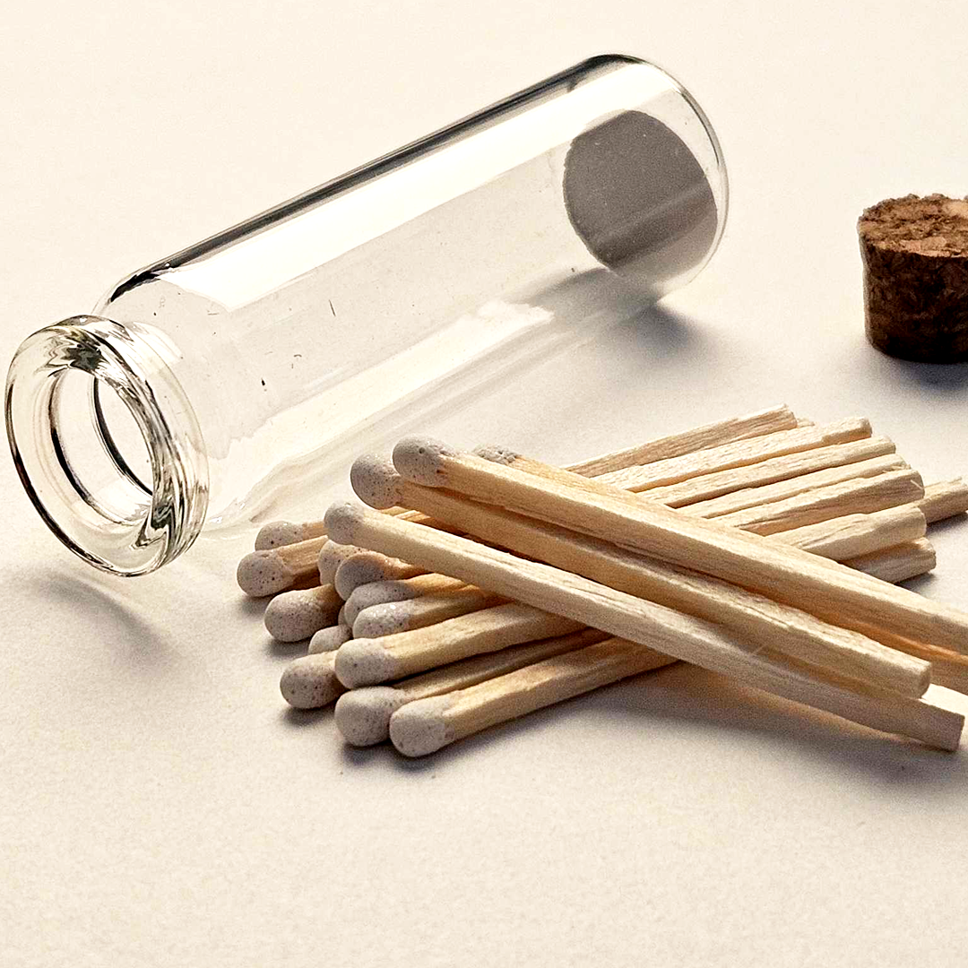 FREE - 1 Corked glass vial .8 W x 2.55 H with 20 matches and adhesive phosphorous match striker on bottom of glass. 2 inch wooden matches are for single use