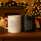 Two mugs with religious quotes on a wooden surface with a festive background.