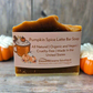 Pumpkin Spice Latte Bar Soap with a label on a wooden surface with pumpkins in the background